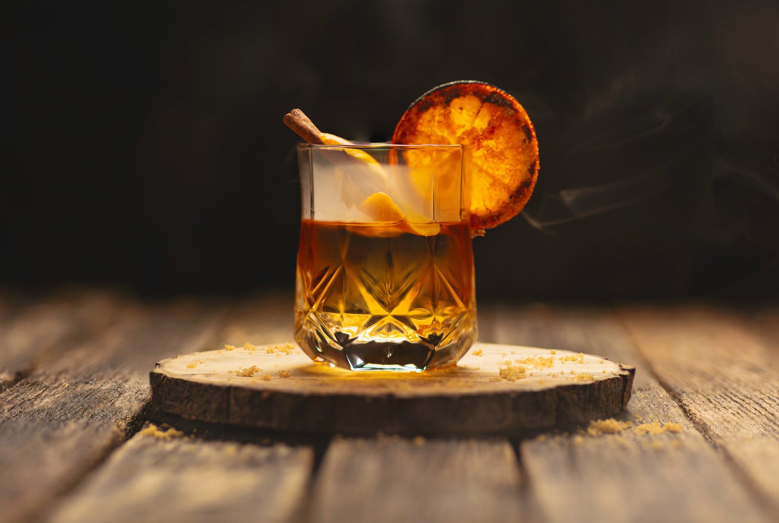 A Smoky Chai Old Fashioned at The Parlour, candlelit